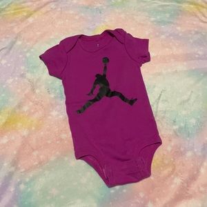 Jordan 0-6mo magenta bodysuit